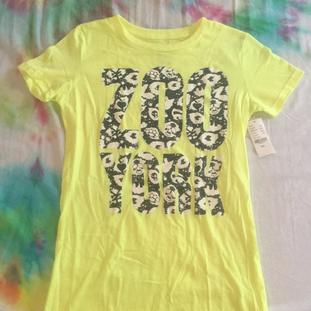 Yellow Zoo York tee w/ brass knuckles and skulls S